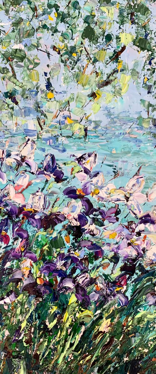 Blooming irises by the pond by Vilma Gataveckienė