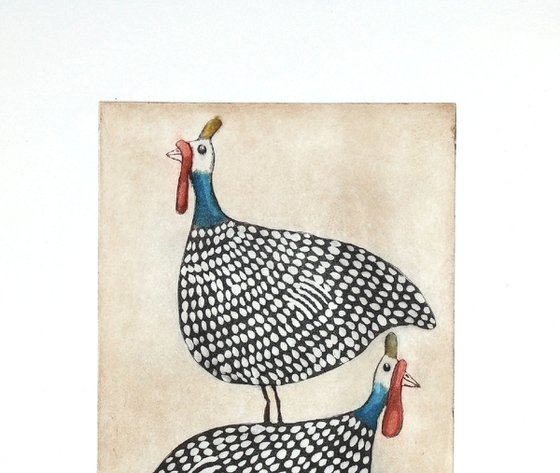 Two little guinea hens