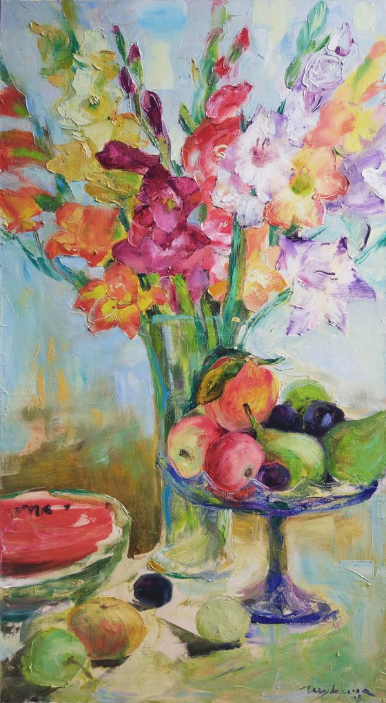 Gladiolus and fruits. The gifts of summer