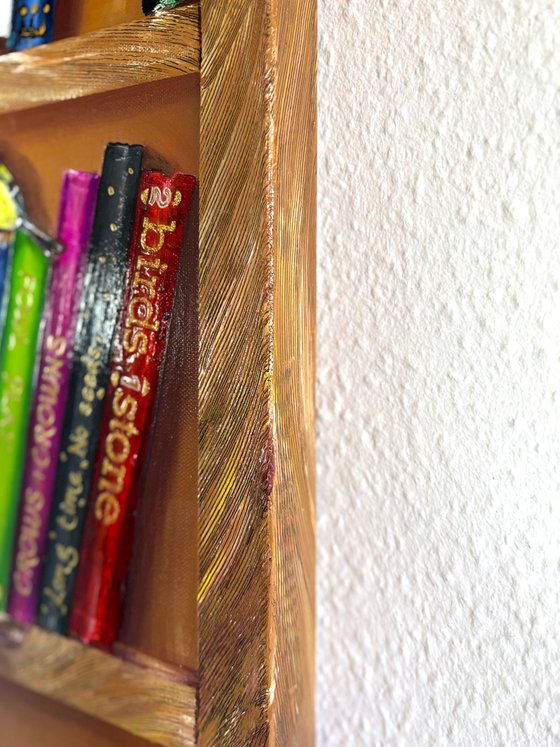 Bookshelf with birds