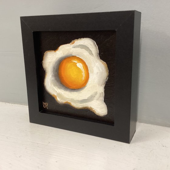 Little fried egg still life