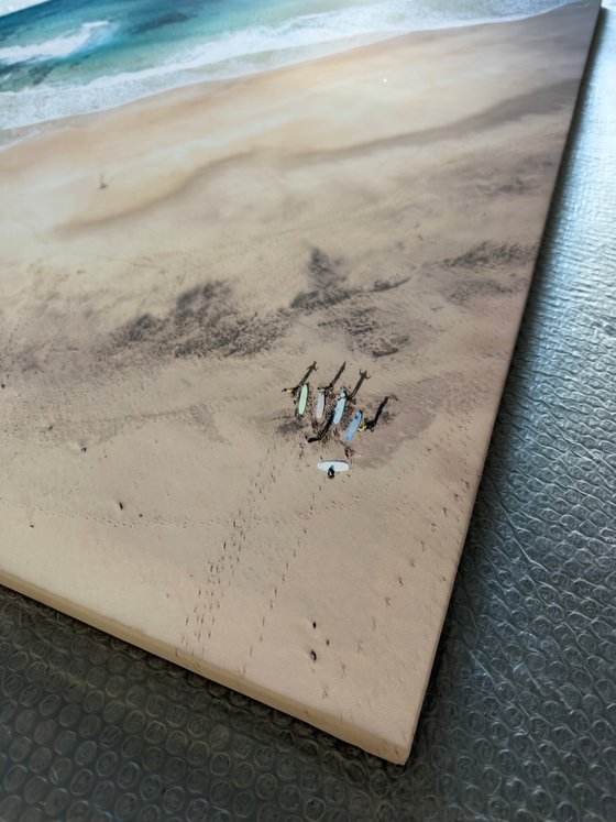 SURFERS ON THE BEACH