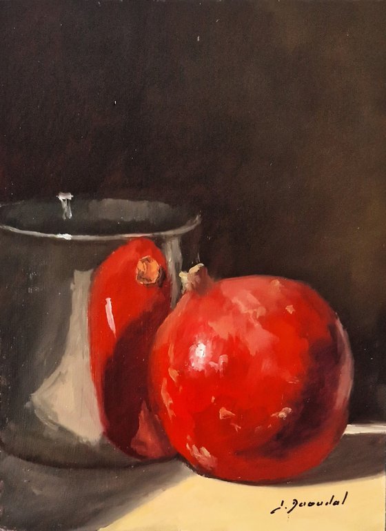 Pomegranate and silver vase