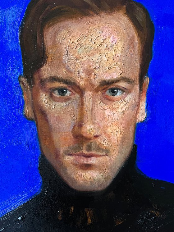 Portrait of Max on Ultramarine blue background