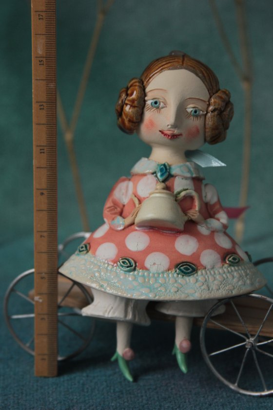 Little Girl with a teapot. Hanging sculpture, bell doll by Elya Yalonetski