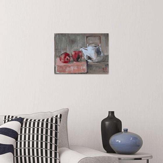 Red apples and teapot