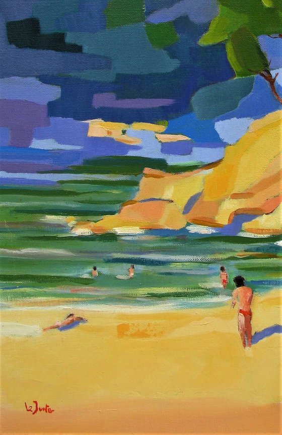 Bathers in Mediterranean cove