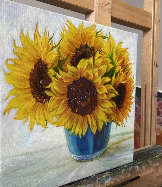 Sunflowers in a Blue Vase