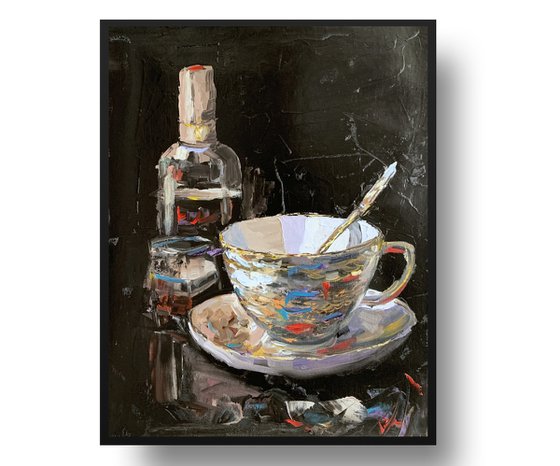 Tea cup and wine on black.