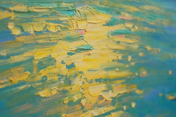 Moonrise in blue over sea