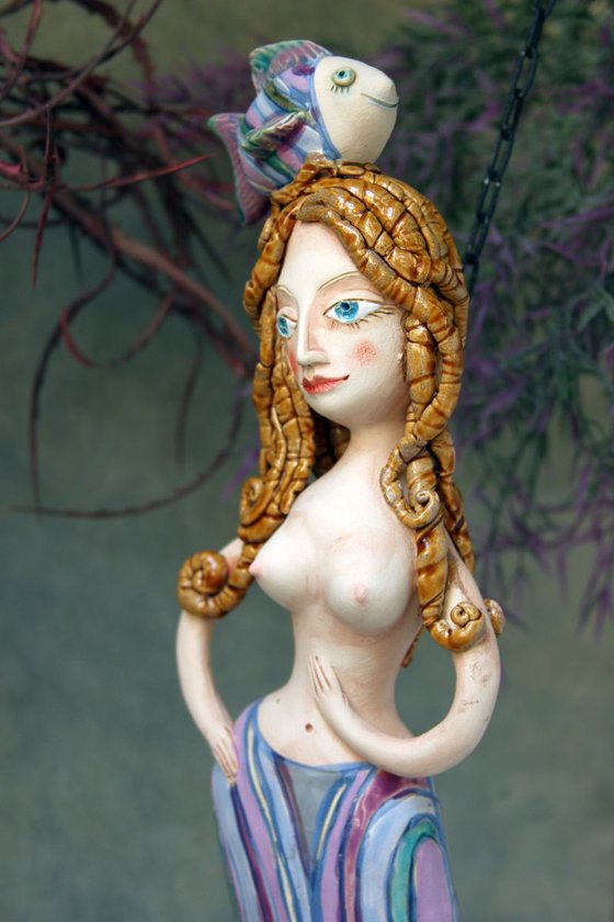 Mermaid with a fish,  Wall sculpture by Elya Yalonetski.