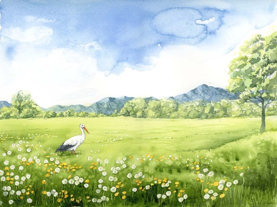 Meadow landscape with white stork