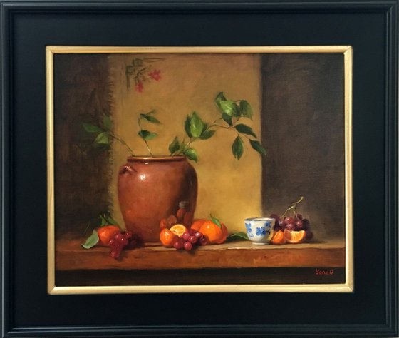 Still life with flower pot, tanderines and grapes. Framed painting. Oil on linen