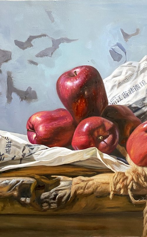 Still life:apples and newspaper on the wooden tables by Kunlong Wang
