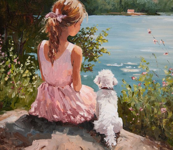 Girl and white dog