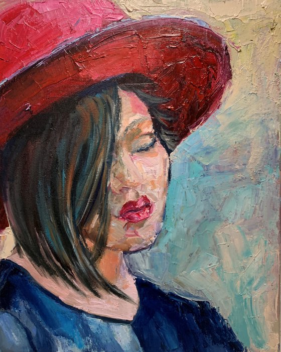 Woman in a red hat.