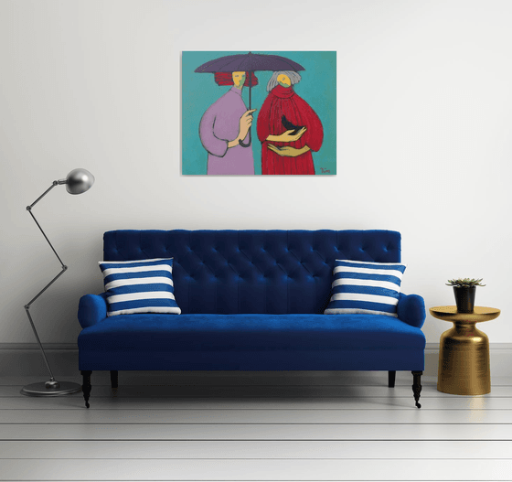 Two under an umbrella.