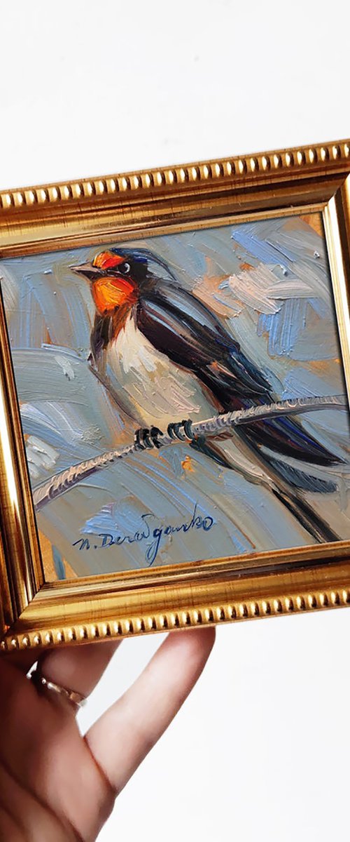 Swallow bird on branch by Nataly Derevyanko