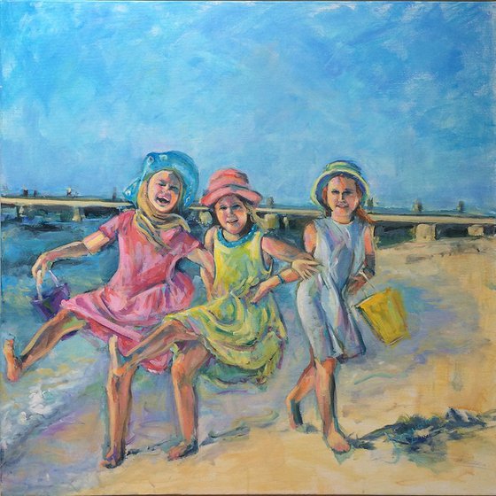 "Girls having fun on the beach"