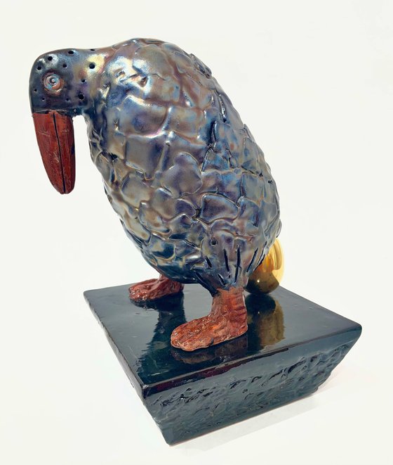 Black Bird with Golden Egg