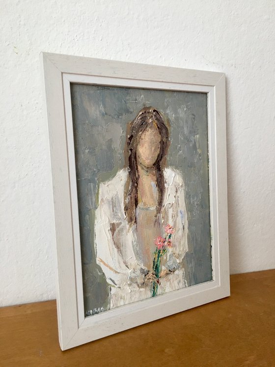Girl with bouquet of flowers