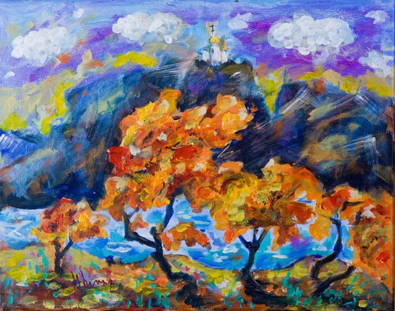 Autumn landscape with a white church