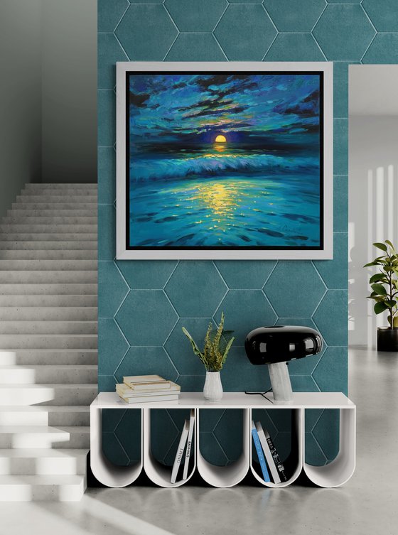 Moonrise in blue over sea