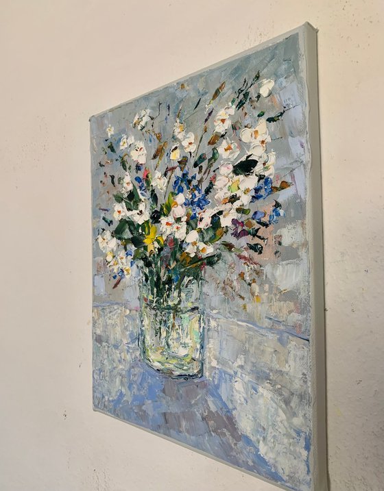 Still life with daisies and cornflowers