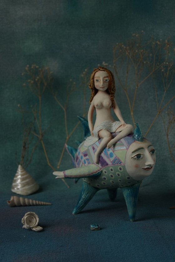 Girl riding the moon fish. Sculpture by Elya Yalonetski, 2018