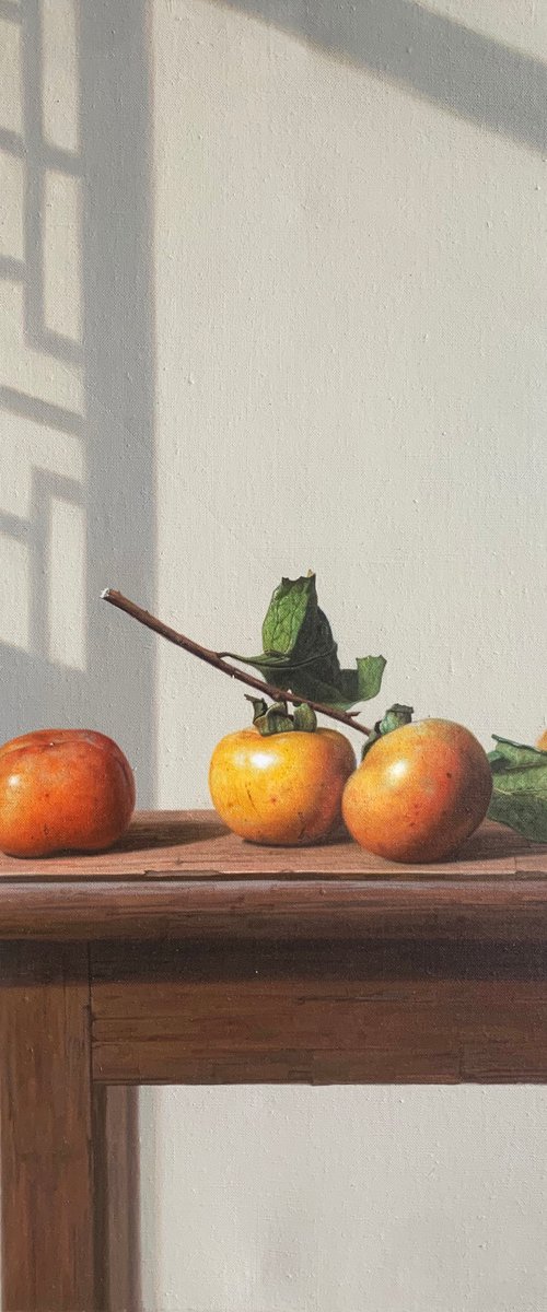 Still life:persimmons on the wooden table by Kunlong Wang