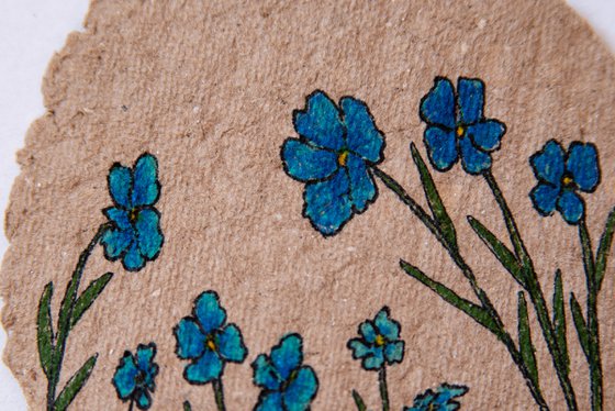 Blue flowers drawing on the author's craft paper