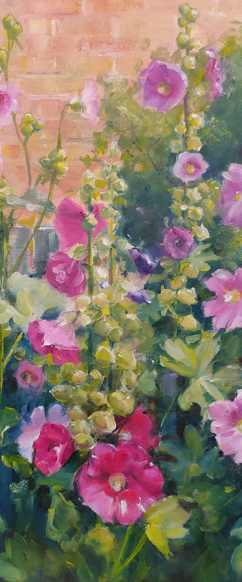Mallows near a fence by Valentina Andrukhova