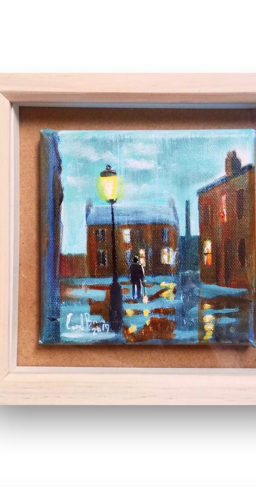 Framed rainy day painting, walking home by Gordon Bruce