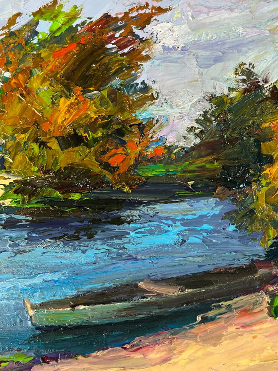 A Boat on the River Bank