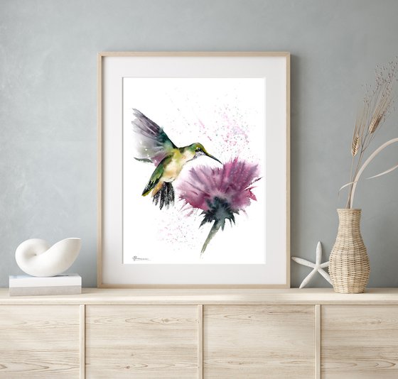 Flying Hummingbird and Flower