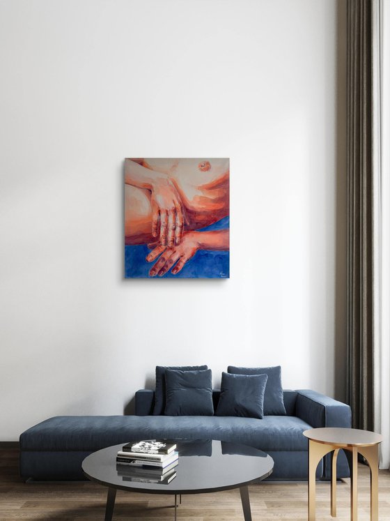 Two hands with blue background