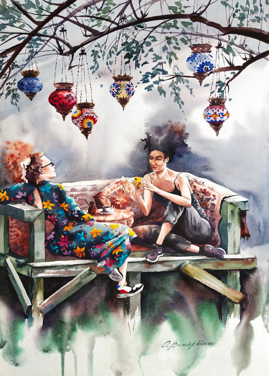 Turkish lanterns - girlfriends drink coffee in a summer cafe by Olga Bezlepkina