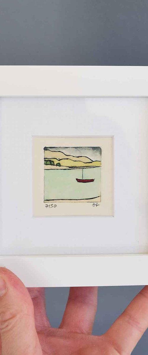 Mini framed little red boat on loch by Sally Fisher