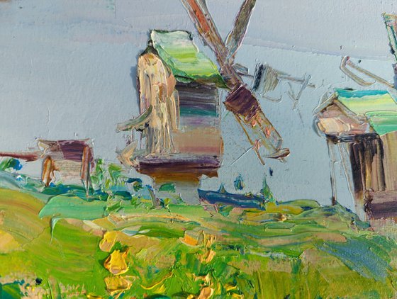 Mills in the tall grass . Summer day .  Original oil painting