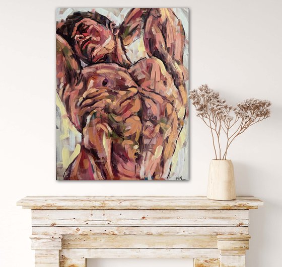Naked man painting