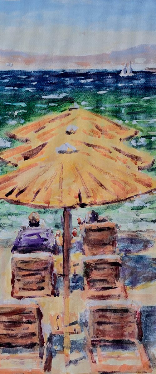 The beach bums by Dimitris Voyiazoglou
