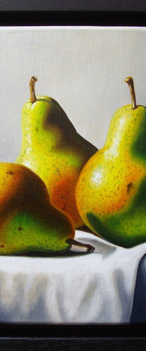 3 pears on white cloth by Jean-Pierre Walter