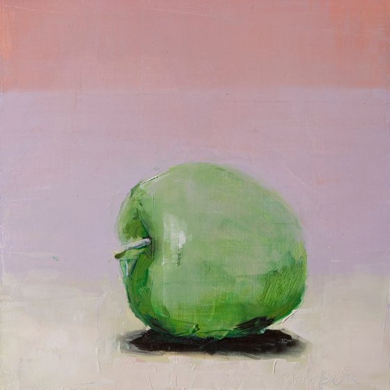 green apple on pink and white