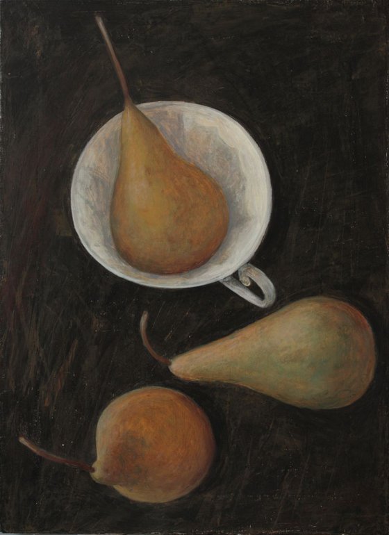 Three pears on black table