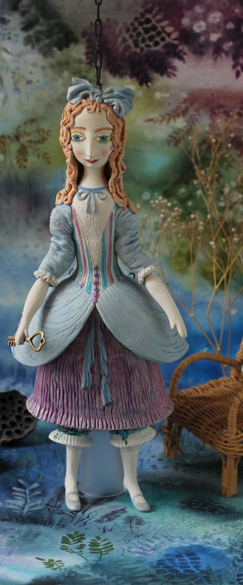 From the Alice in Wonderland. Alice, grown up. Wall sculpture by Elya Yalonetski by Elya Yalonetski