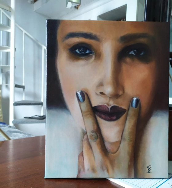 Fingers on lip