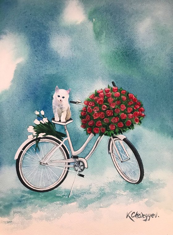 Kitten on a bike