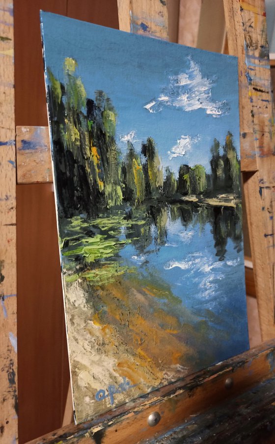 Impression. Sunny riverbank