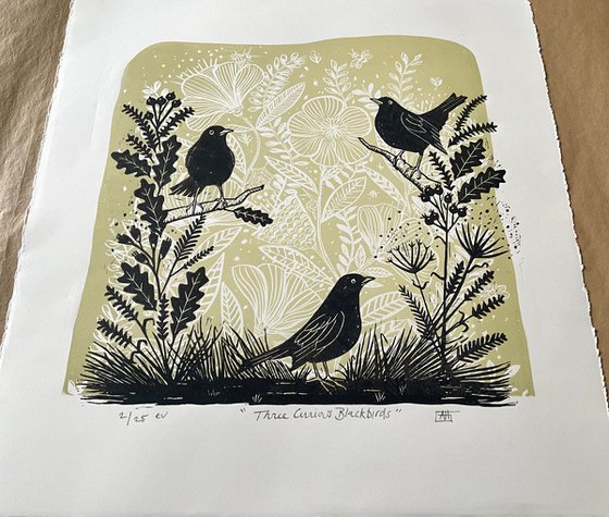 Three Curious Blackbirds