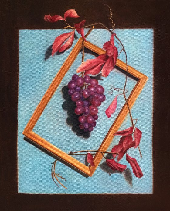 A BUNCH OF GRAPES IN A FRAME